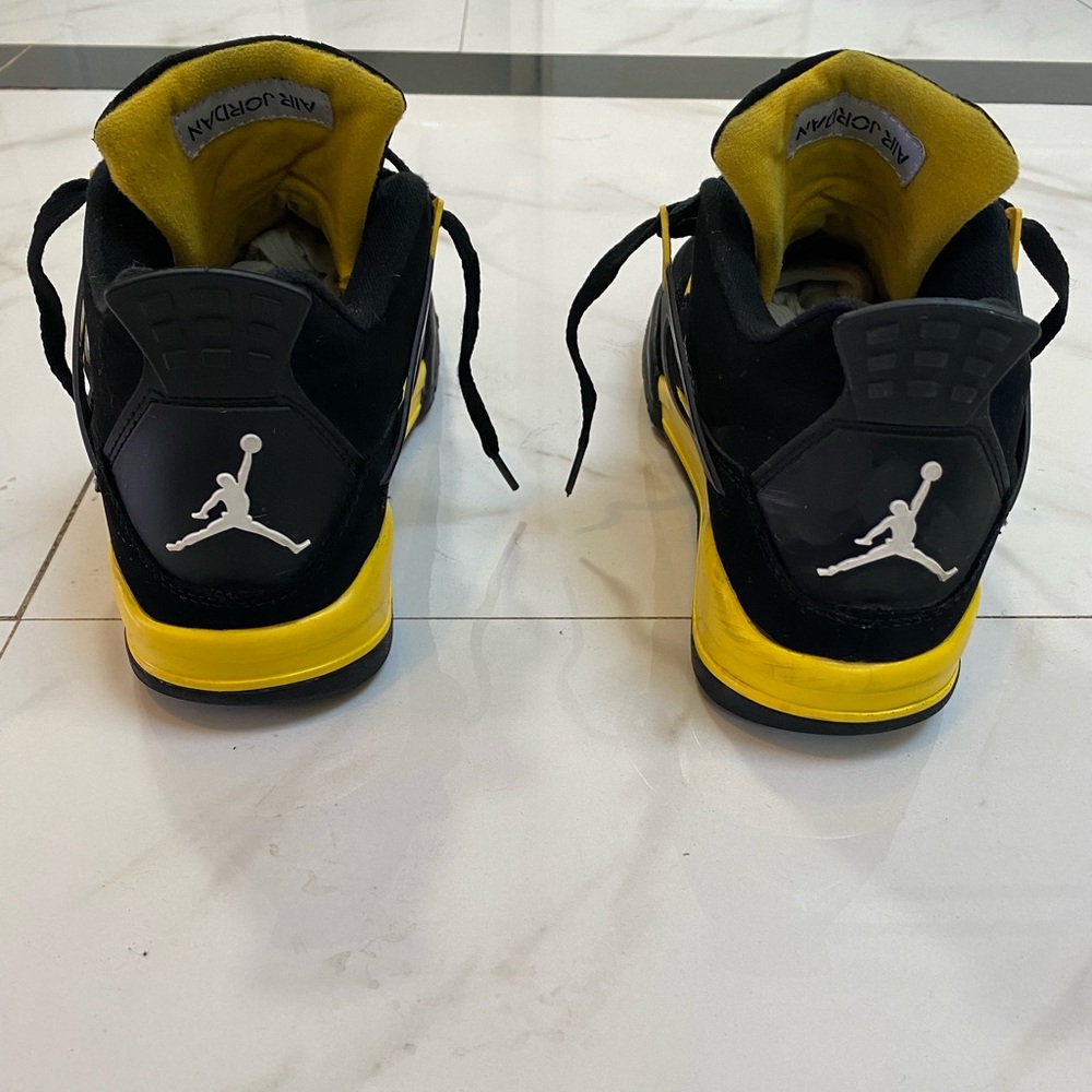 Wiz Khalifa Black and Yellow suede Jordan 4’s